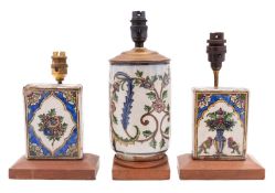 Three pieces of Qajar pottery mounted as lamps,