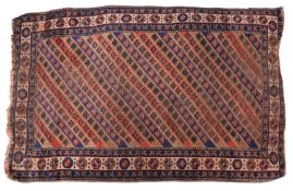 A Derbend rug, the light brown, indigo and brick red striped field with repeated stylised designs,