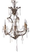 A Continental glass and metal seven light chandelier in Louis XV taste,