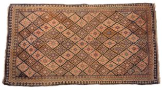 A Qashgai Kelim, the shaded lozenge geometric lattice field with shaped cruciform designs,