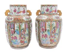 A pair of Chinese Canton famille rose enamel vases,