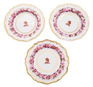 A pair of Flight, Barr & Barr armorial deep plates and a matching dinner plate,