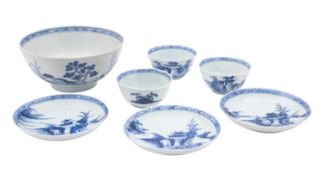 A set of three Chinese 'Nanking Cargo' blue and white teabowls and saucers and a similar slop bowl,