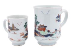 Two Chinese porcelain mugs of bell shaped form decorated in under glaze blue,