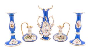 A pair of Coalport blue-ground candlesticks, a similar vase and a pair of Bloor Derby ewers,