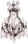A Louis XV style metal and glass twenty-five light 'cage' chandelier,
