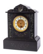 Two Victorian black slate mantel clocks each having an eight-day duration,