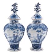 A pair of Dutch Delft vases De Posteleyne Byl [ The Porcelain Hatchet]