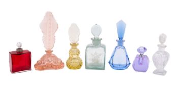 A mixed group of Czech and other coloured and cut glass scent bottles and stoppers,