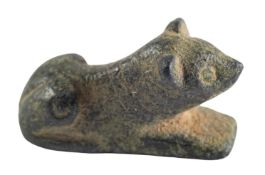 A ROMAN BRONZE MODEL OF A BEAR, CIRCA 2ND CENTURY A.D., with a decorative band across the back;