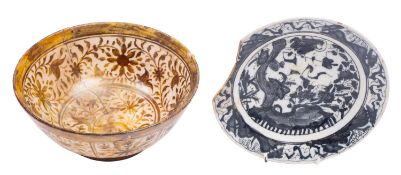 A Persian Kashan lustre bowl, 12th/13th century and a Safavid blue and white dish,