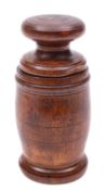 An unusual turned walnut grating mortar,
