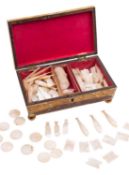 A collection of Chinese engraved mother of pearl gaming counters, 19th century, circular,