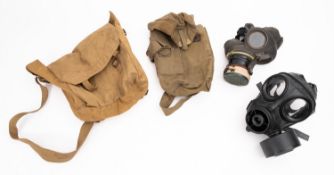 A WWII period gas mask and canvas bag,