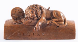 A 19th Century carved wood 'Lion of Lucerne'.