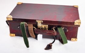 A 20th Century Farlows of Pall Mall brown leather and brass bound cartridge case,