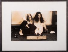 After Jane Brown. A black and white photograph of John Lennon and Yoko Ono