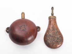 A 19th century brass mounted gourd powder flask,