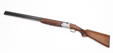 A Beretta Silver Pigeon 12 gauge over under shotgun.