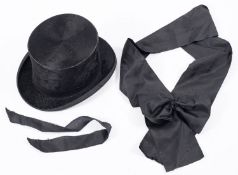 A Lincoln Bennett and Co black silk top hat.