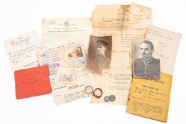 A collection of miscellaneous militaria, including three Army Service/ID books for Lt.