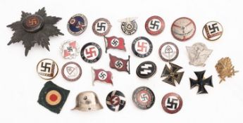 A Collection of NSDAP badges. *Notes- Sold as catalogued.
