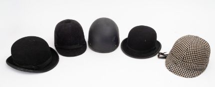 A Houndstooth covered riding hat, a Loveson riding hat ,