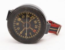 A WWII German Bakelite 'Armbandkompass' maker Kadlec , Prague, serial number 39341 FL 23235,