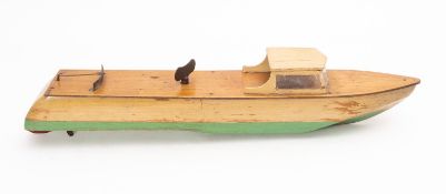 A mid 20th century clock work motor launch, white painted cabin over simulated planked deck,