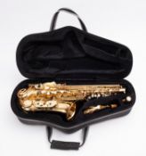 A sakkusu brass alto saxophone. Serial number N.
