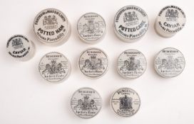 Seven 'Burgess's Anchovy Paste' pot lids and bases together with four other potlids and bases ,