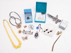A small parcel of costume jewellery including a Butler & Wilson floral spray brooch,