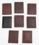 A group of eight quarter plate Ambrotype portraits. Comprising men, women and children, all cased.
