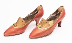1970s/80s women's red leather heeled shoes with gold detailing.