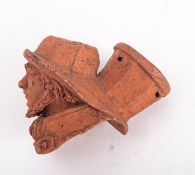 A rare late 19th century terracotta fisherman's head pipe bowl, modelled wearing a sou'wester,