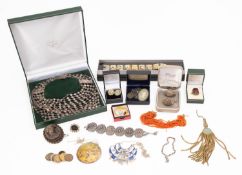 A parcel of various silver and costume jewellery comprising necklaces, brooches etc.