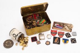 A collection of British WWII regimental buttons, caps badges and insignia, mainly RE and Royal Navy.