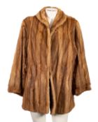 A group of mid 20th century lady's furs, comprising a brown full length fur,