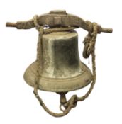 A 19th Century cast bronze bell. Having a ring suspension and cast iron clapper, 40cm high.
