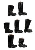 Seven various pairs of black leather boots, in a range of sizes, mainly size 10.
