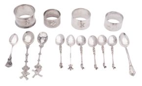 A mixed lot of silver, to include four napkin rings, five continental tea/ coffee spoons,