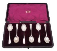 A late Victorian cased set of six silver teaspoons, Old English pattern with scallop shell bowls,