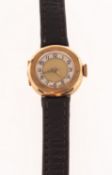 A 14K gold Swiss lady's wristwatch, the dial with Arabic numerals,