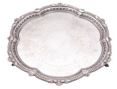 A late Victorian silver salver, of hexafoil outline, with a bead,