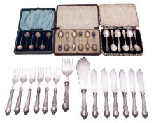 Two cased sets of silver tea/ coffee spoons,