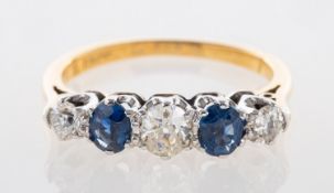 A Victorian sapphire and diamond five stone ring on yellow metal,