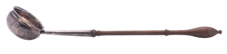 A George II silver toddy ladle, with a deep circular bowl and a baluster turned wooden handle,