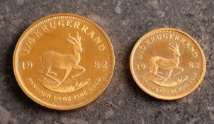 A cased 1982 1/4 and 1/10 Kruggerand, both contained in original fitted box; the box