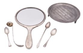A mixed lot of silver, to include a circular waiter, a hand mirror, a continental ladle,