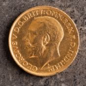 A George V sovereign, bare head, reverse with St. George and The Dragon and dated 1911